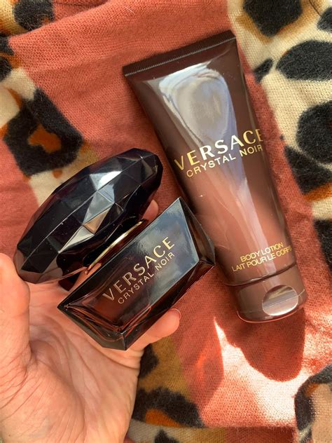 estee lauder sensuous vs versace crystal noir